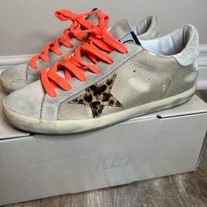 Like NEW! Worn once; excellent condition! Super cute pop of color with the laces